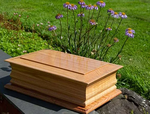 This is available in oak or mahogany. Double Oak Casket