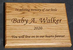 Wooden memorial for a baby.