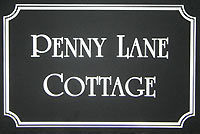 Reflective house sign