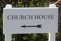 Painted house signs on painted oak posts Painted house signs on painted oak posts