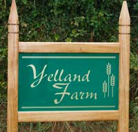 Simple entrance sign with gothic posts tops Simple entrance sign with gothic posts tops