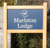 Simple entrance sign with bevelled posts tops Simple entrance sign with bevelled posts tops