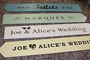 Rustic directional arrow signs.