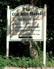 Sign board on two posts with finials