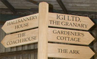 Wooden finger posts both in natural oak or painted wood Wooden finger posts both in natural oak or painted wood