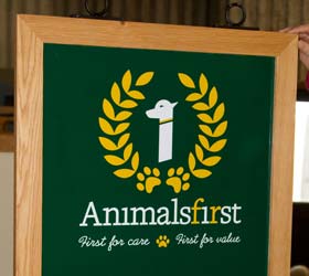 Wooden framed hanging sign. Wooden framed hanging sign.
