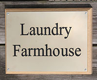 Engraved brass house sign. Engraved brass house sign.