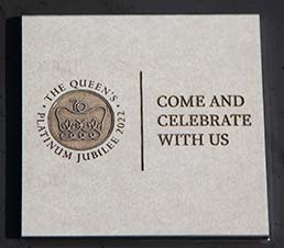Detailed engraved paperstone plaque.