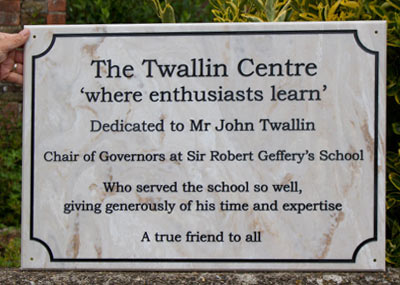 Large engraved plaque in marble Corian.