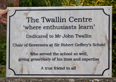 Large engraved plaque in marble Corian. Large engraved plaque in marble Corian.