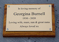 Engraved plaque - Brass on a backing board