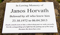 White corian memorial plaque.