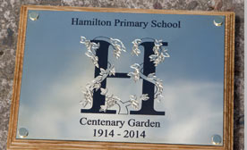 Made to measure engraved brass plaques