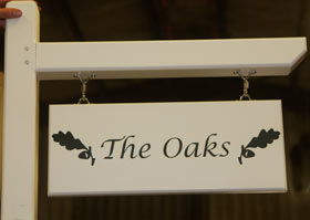 Post and arm for hanging signs Post and arm for hanging signs