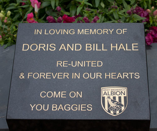 Granite wedge with gold lettering and laser etched logo.