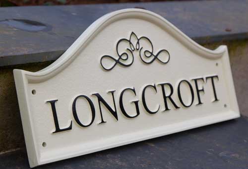 Tough cast polyurethane house sign