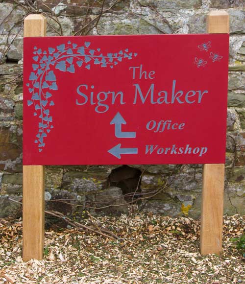 Painted slate sign inset into oak posts
