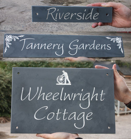 Slate house signs using the font Worstveld Sling