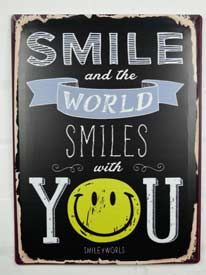 Smiles and the world smiles with you sign