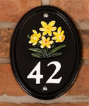 Cast aluminium house number.