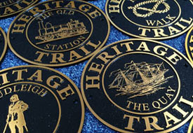 Cast bronze signs for hertitage trail.