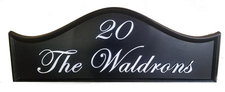Arch top house sign using Edwardian Script font.