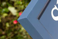 Painted wooden sign - edge detail Painted wooden sign - edge detail