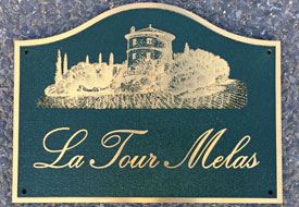Detailed bronze house sign