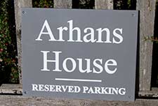 Engraved slate corian house sign.