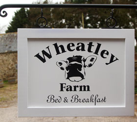 Tradition painted hanging sign Tradition painted hanging sign