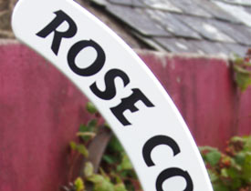 Entrance signs made in the shape of a hockey stick Entrance signs made in the shape of a hockey stick