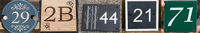 House number signs in many materials.