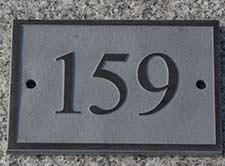 Raised slate numbers.