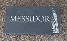 Slate name plate with an image.