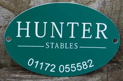 Building Nameplate - Green with white engraved text