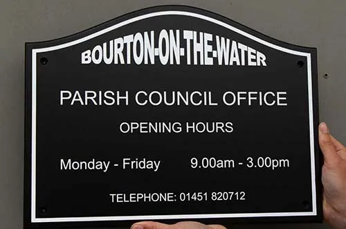 Shaped Black and White Sign