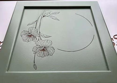 This was laser etched through paint onto Tricoya board. Detailed Image laser etched through the paint.