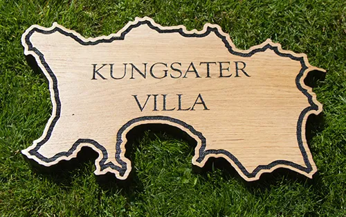 Wodden sign cut into the shape of Jersey