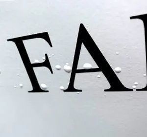 Close-up of problem with bubbles on a painted sign