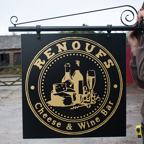 Unique fonts can make signs stand out but they must still be easily read. 