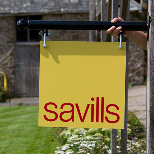 Business signs crafted in a variety of colours and materials.