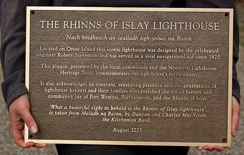 This is a patinated bronze plaque - no paint used. Bronze Lighthouse Plaque