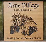Wooden sign with detailed image.