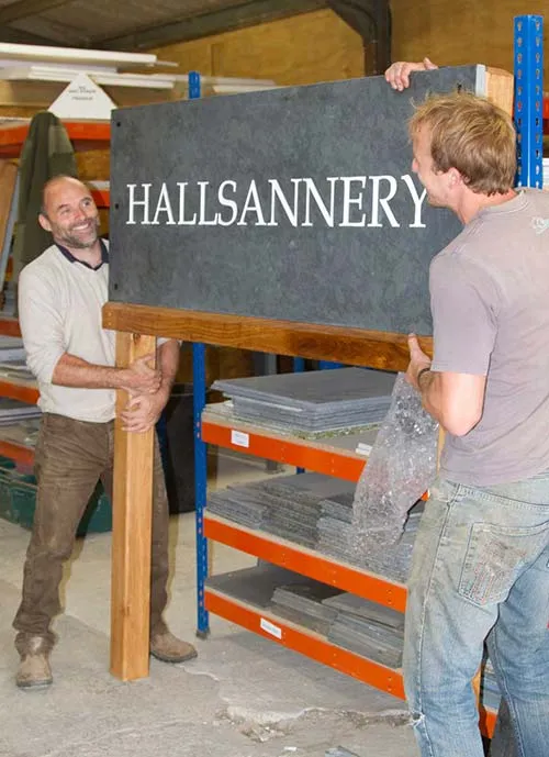 The Sign Maker is kown for its wood and slate signage. Sign Makers at Work