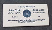 Engraved corian plaque.