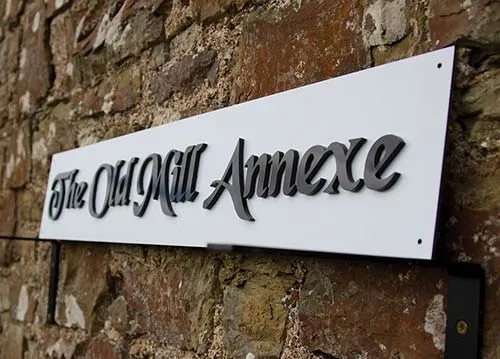 House Sign with Raised Lettering
