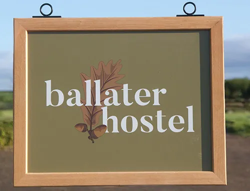 Wood framed hanging sign with printed image