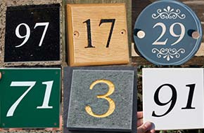 House numbers and house number signs.