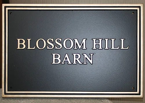 title here Rectangular cast house sign