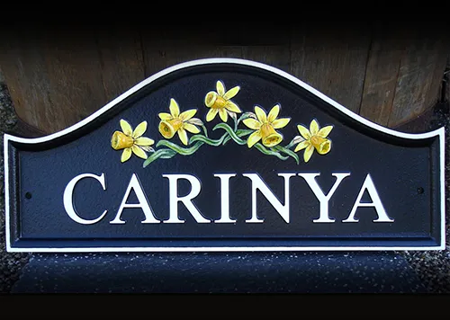 title here Dome top cast house sign with motif